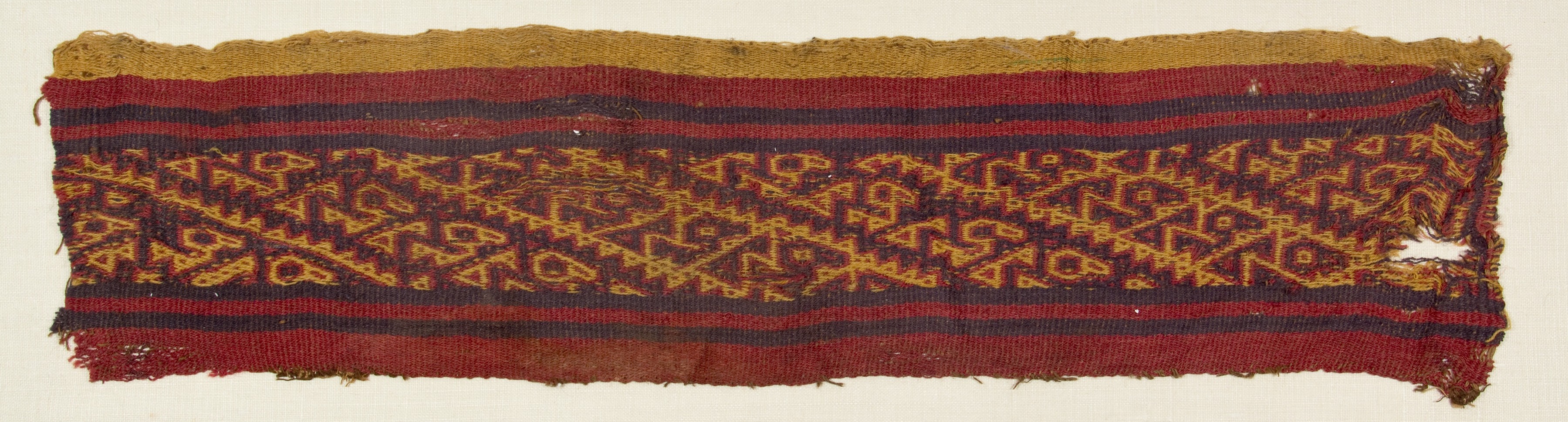 Textile fragment, Chancay, Peruvian, 53.4 x 12.7cm, The Art and Art History Collection.